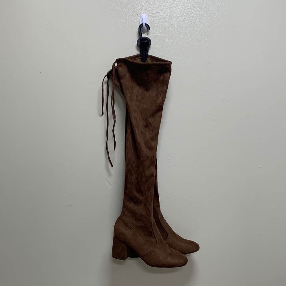 BRAND new brown suede knee high tie boots forever 21 size 7! Never worn.